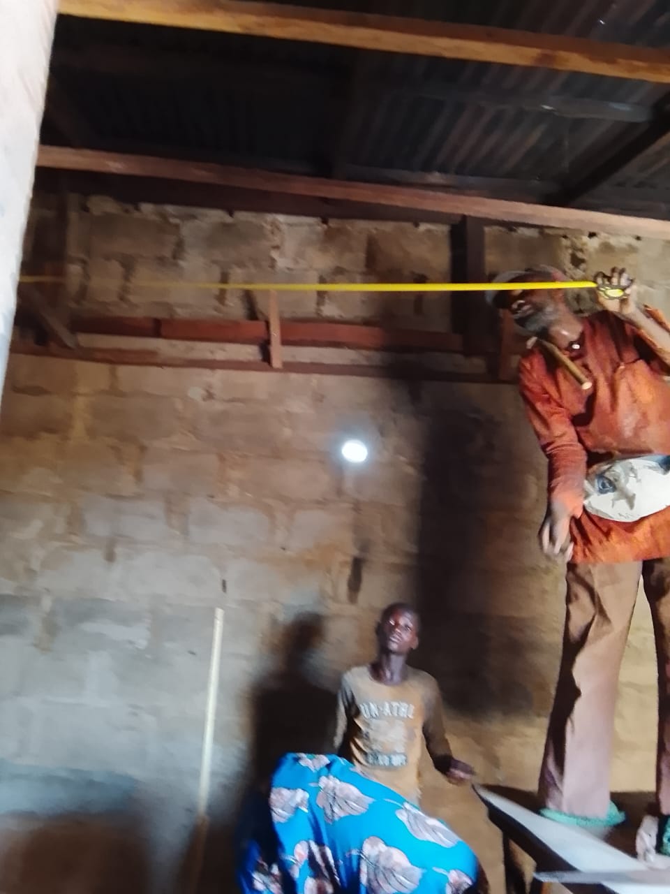 Workers building the care space.