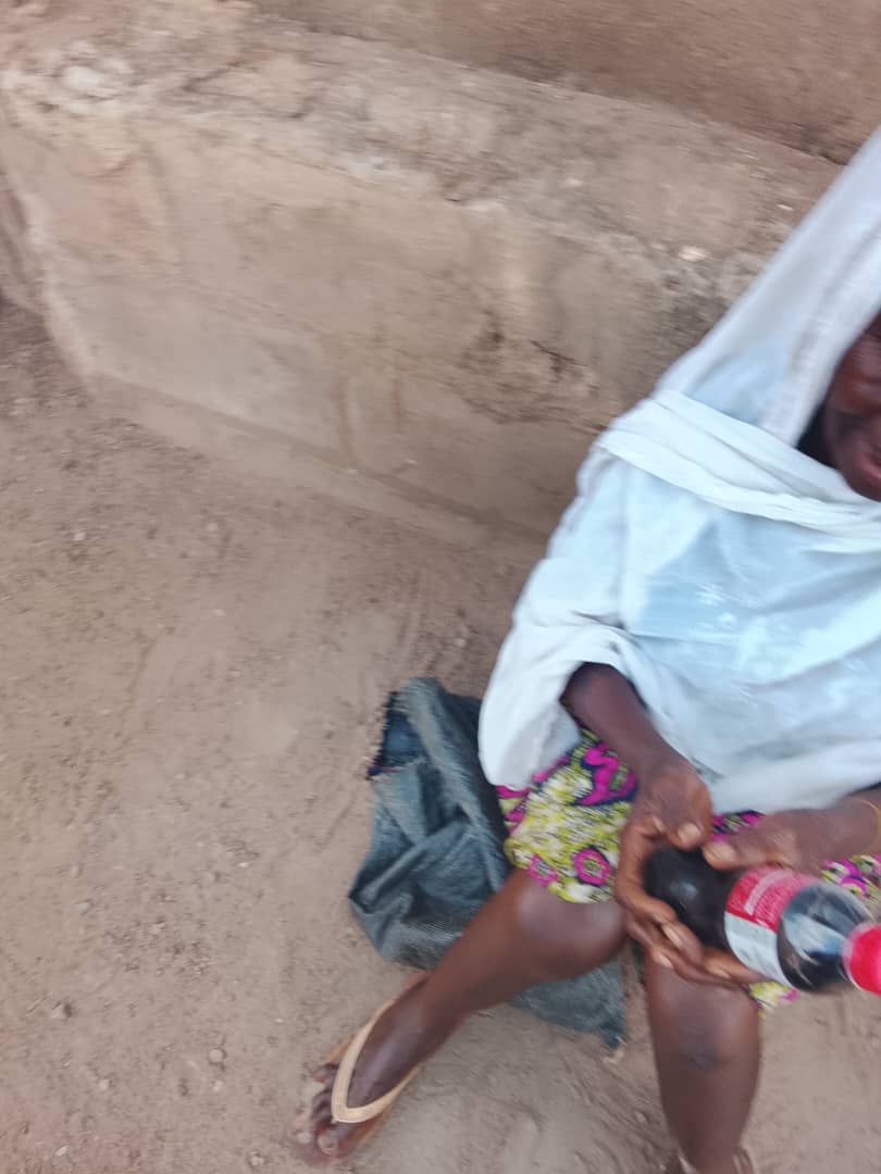 An elderly woman receiving support from the foundation.